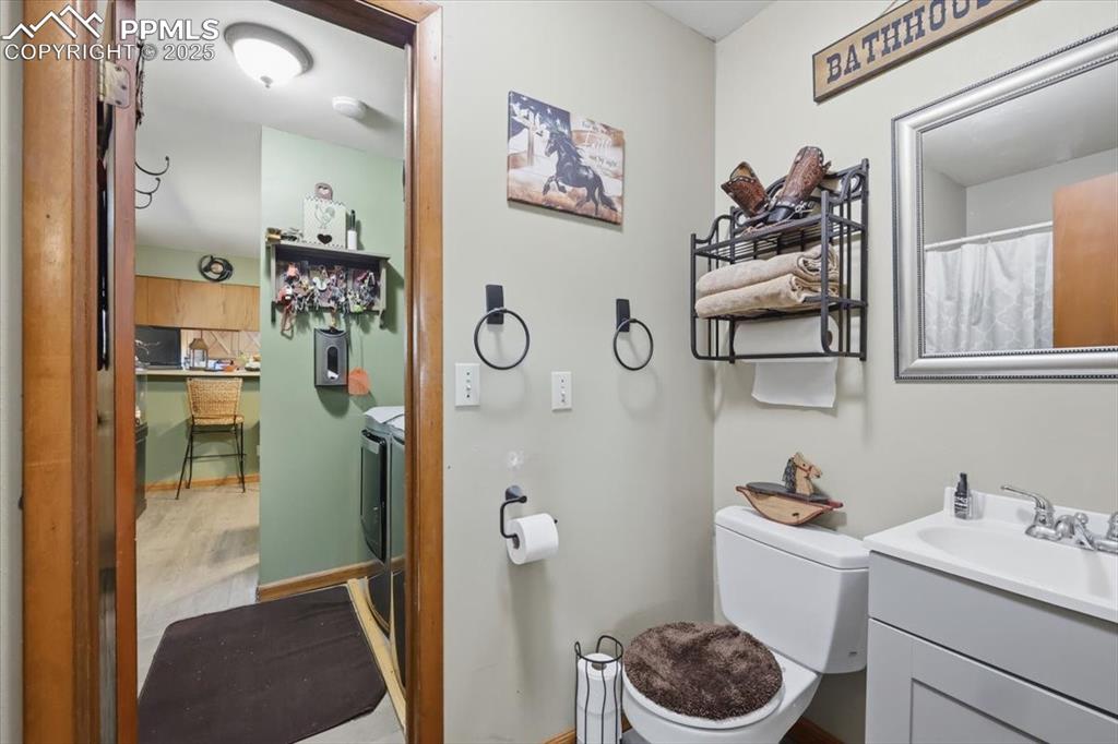 Primary 3/4 bath has an additional door that leads into the laundry area