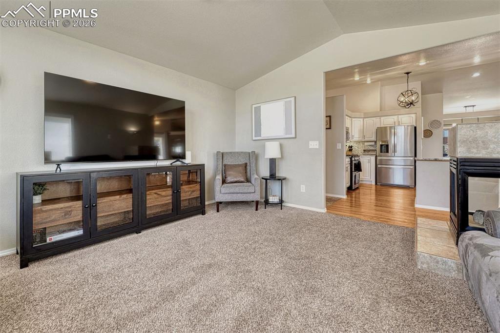 Just steps from the kitchen and with easy access to the outdoor living areas, the family room offers a comfortable space for gathering and making memories. Flanked by a 3-sided gas fireplace, the room is spacious but really feels cozy on a long winter night