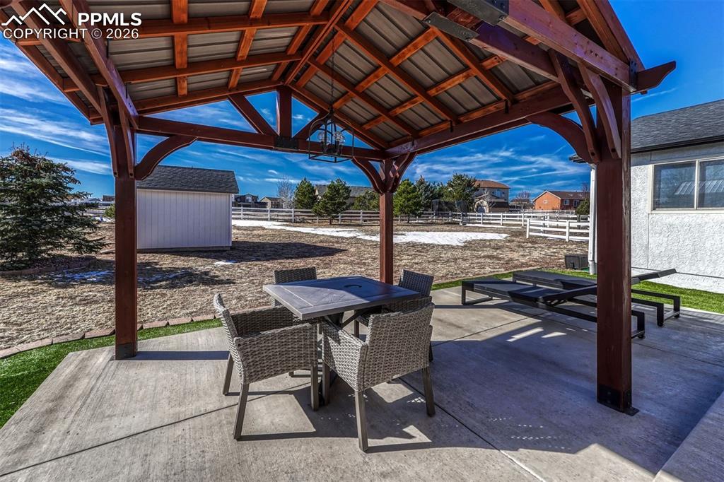 From the back porch, there's easy access to the secure stoarge shed