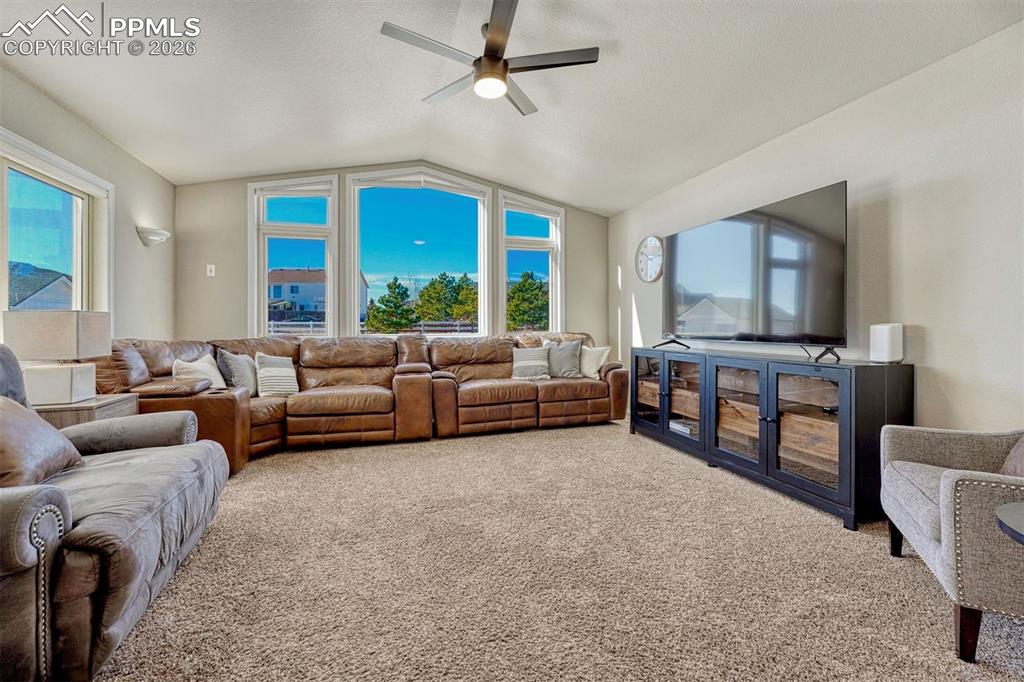 With abundant natural light, the family room is conveniently near the kitchen and spacious back yard