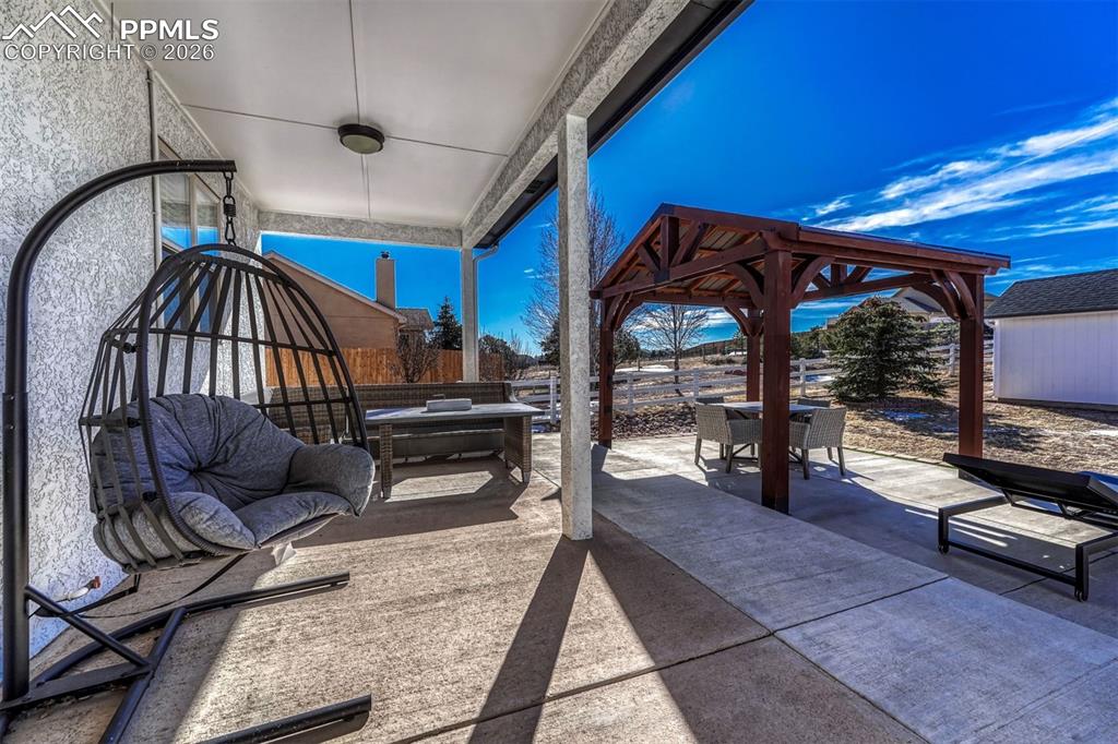 Step into the backyard and enjoy year-round sunset views, with the space already plumbed for gas and wired for 220V—ideal for creating a fully equipped outdoor living area