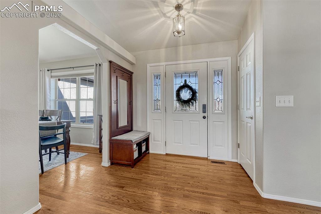 From the moment you walk in, the hardwood floors and bright open spaces are welcoming