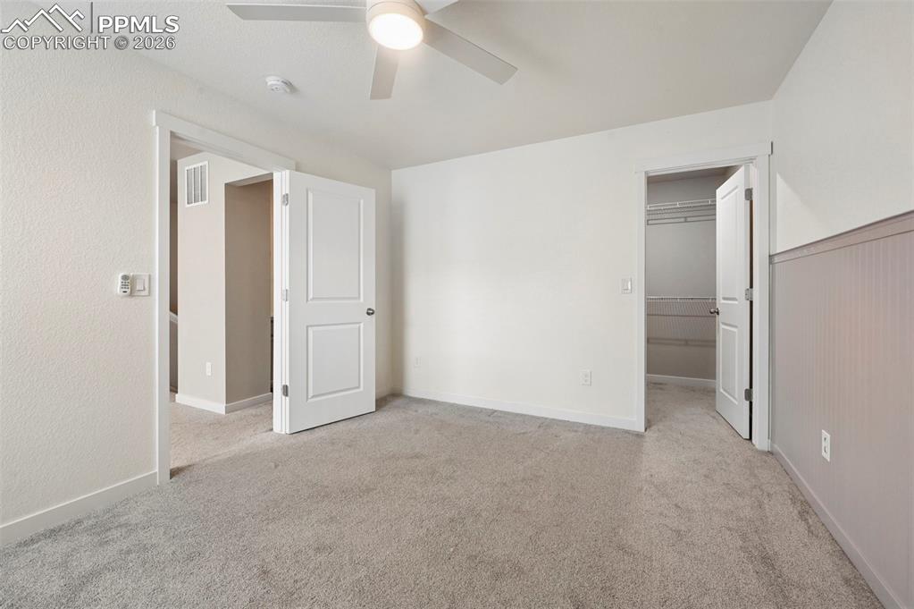 secondly bedroom with walk in closet