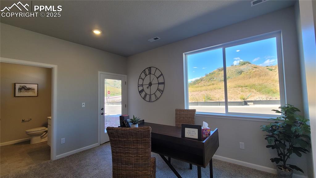 Main Level Bedroom with ensuite and private patio!