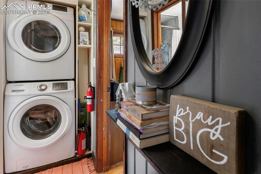 Laundry space with stacked washer and dryer