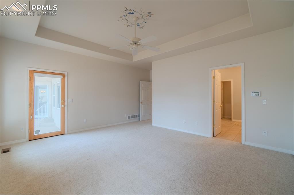 Primary Bedroom with Door to the back patio