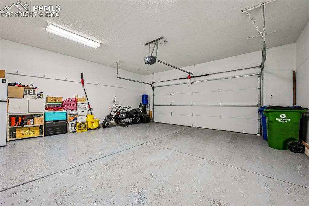 Oversized 2 car garage with epoxy floor