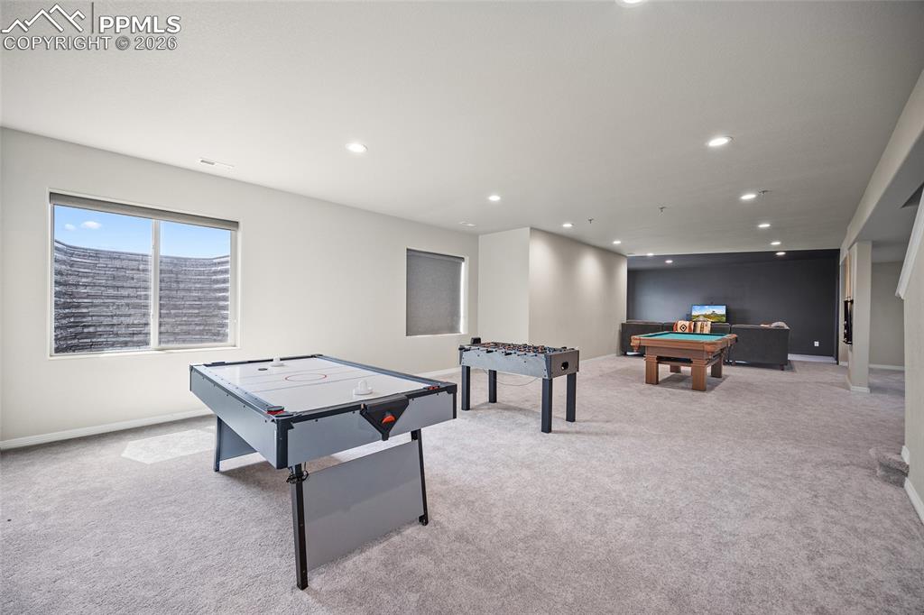 Recreation room featuring billiards, recessed lighting, and light carpet