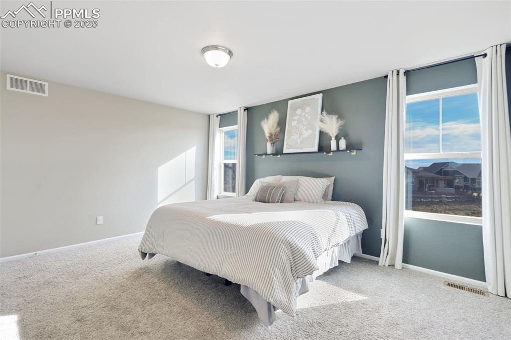 Bedroom featuring carpet floors