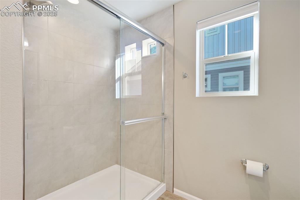 Bathroom featuring a stall shower
