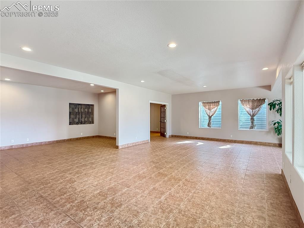 front view beside grand stone stairs