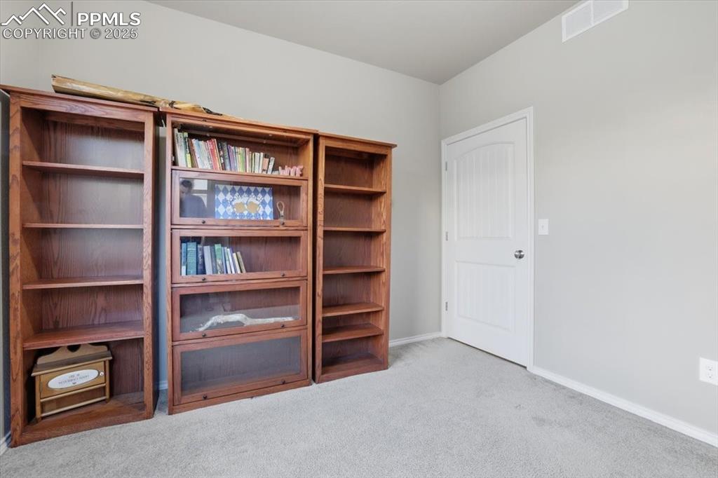 This private office is spacious and overlooks the back yard. 