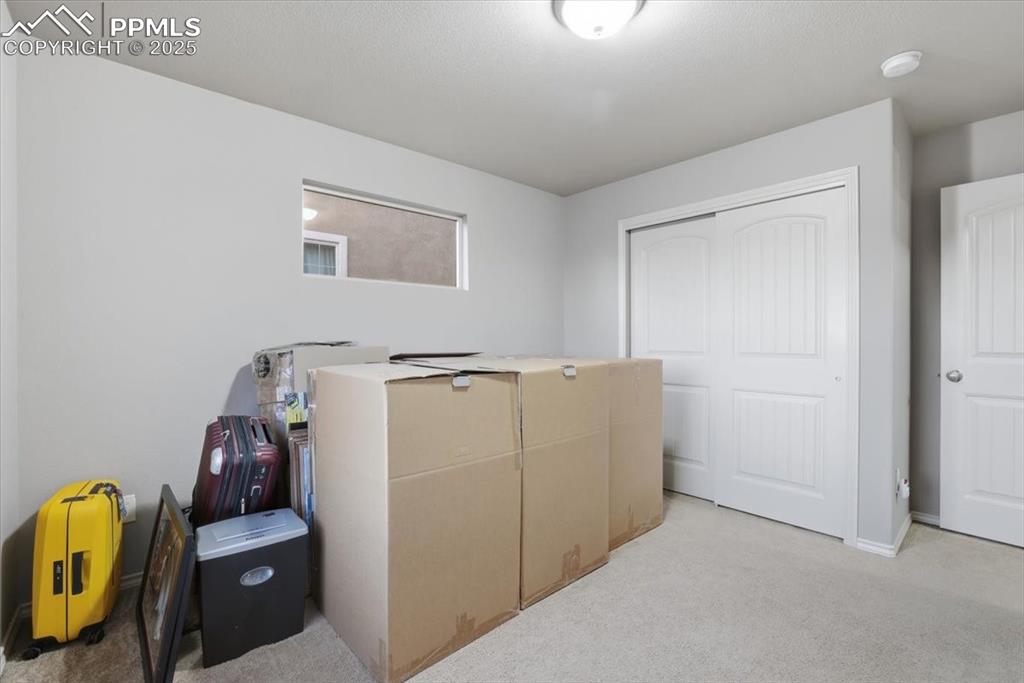 The third upper-level bedroom has a double closet. 