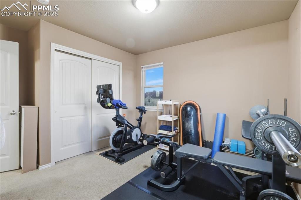 The fourth upper level bedroom is a junior suite with a private bath and a double closet. 