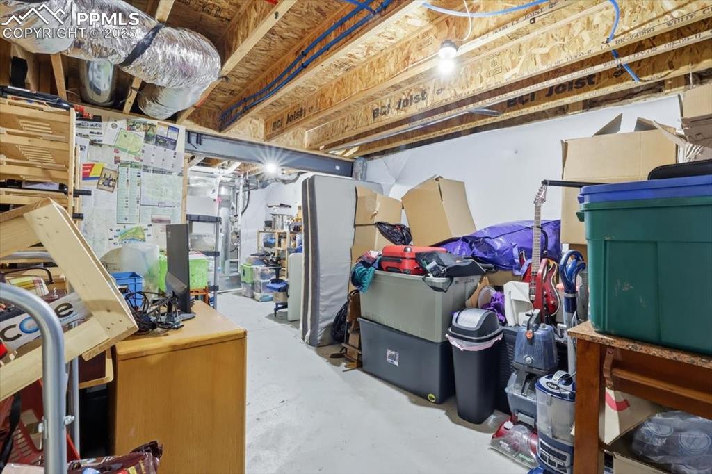 The basement storage room has included wine storage and room for all your stuff.