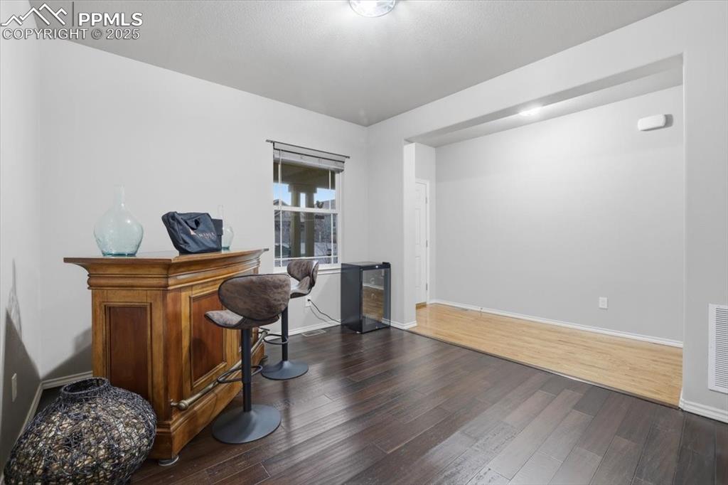The formal dining room connects to the kitchen and could also be used as an office. 