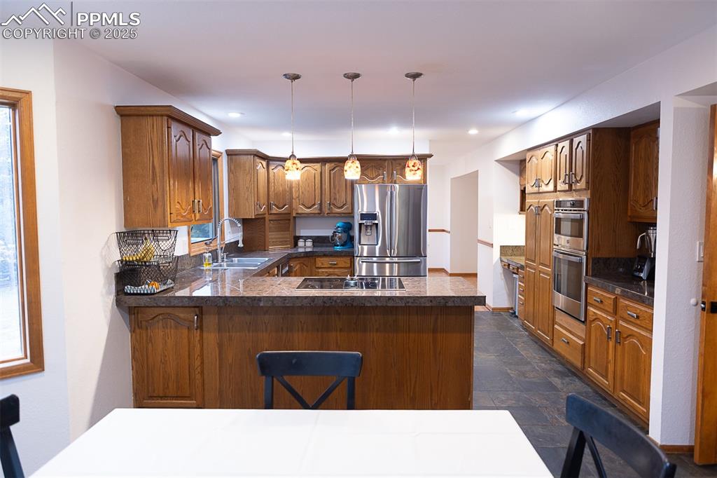 Looking into the kitchen from the breakfast nook.