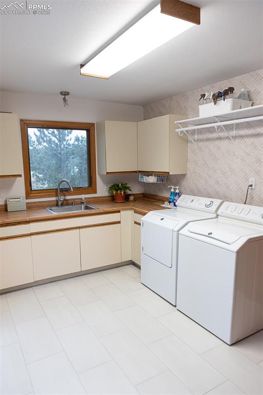 Large laundry room with garage and deck access.