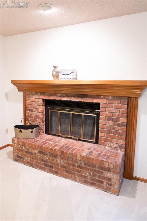 Gas fireplace in primary bedroom.