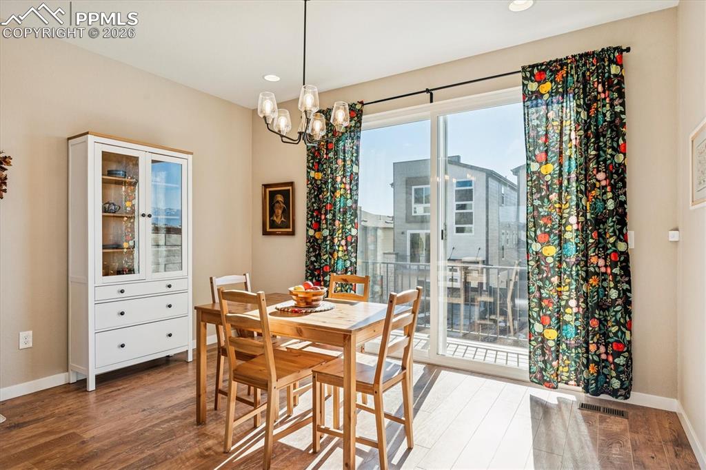 Dining Room with Sliding Door to Balcony