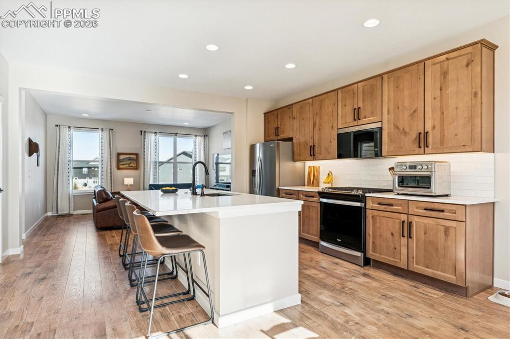 Kitchen with Upgraded Cabinetry & Walk-In Pantry