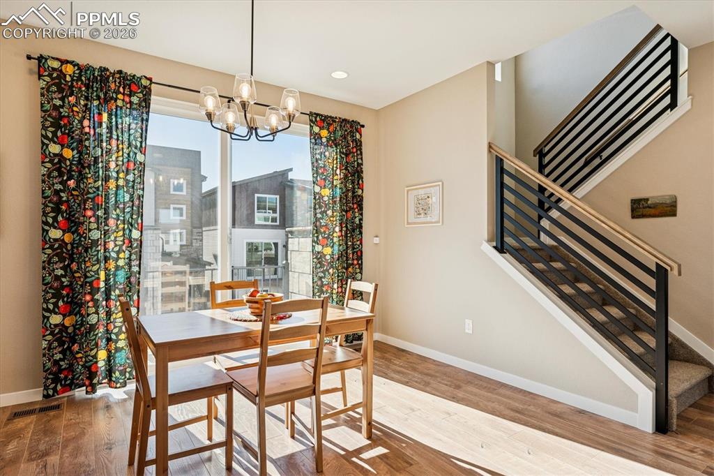 Spacious Dining Room with Laminate Flooring