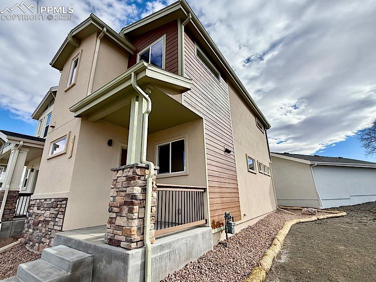 Front and Side of Home.Please, excuse our dust as this home is currently under construction. 