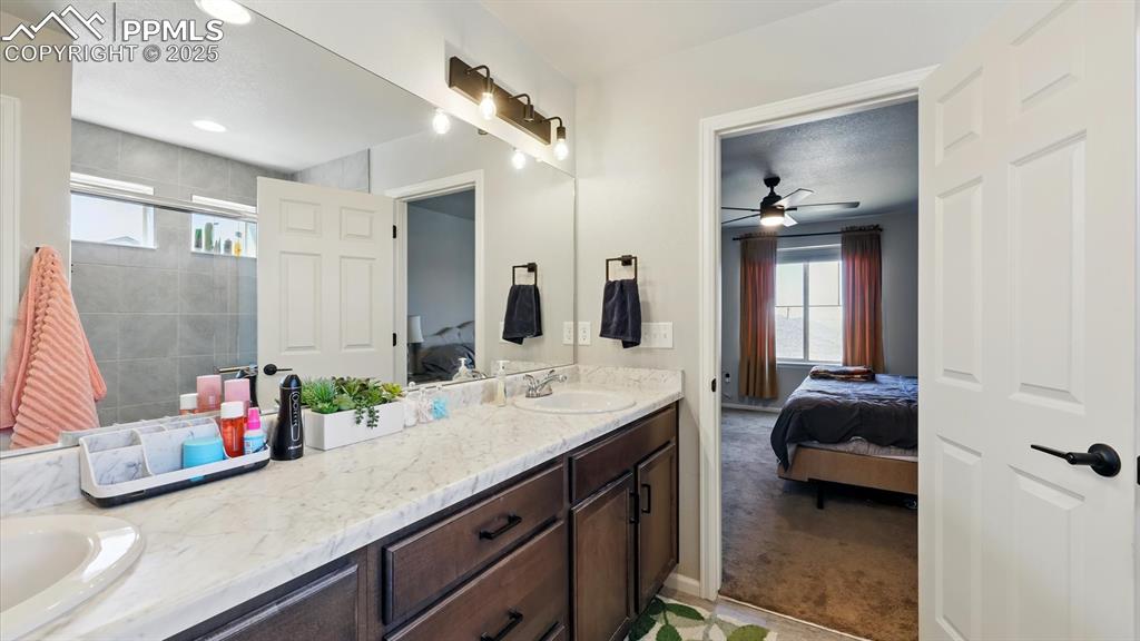 View into the Primary Bedroom from the Primary Bathroom.