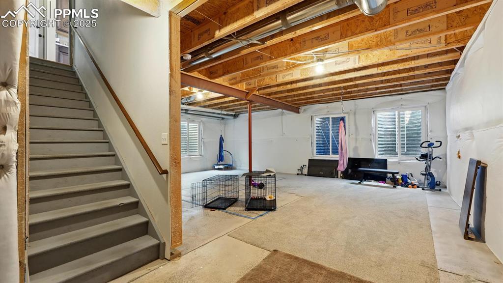 Room for expansion in the 920 square foot unfinished basement.