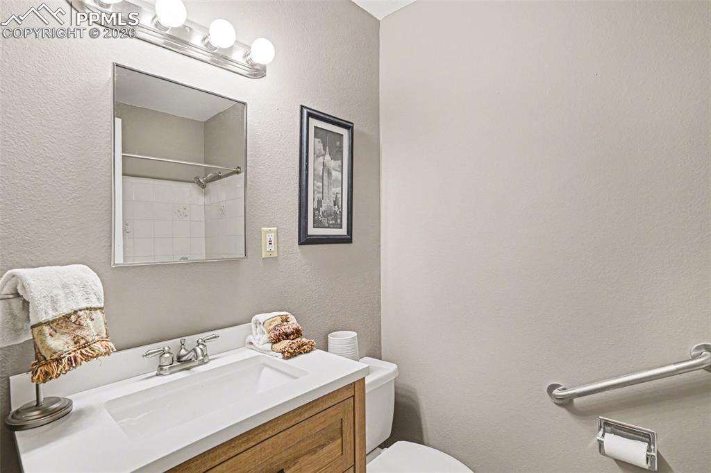 Bathrooms shine with updated vanities, new tile flooring, and stylish fixtures. 