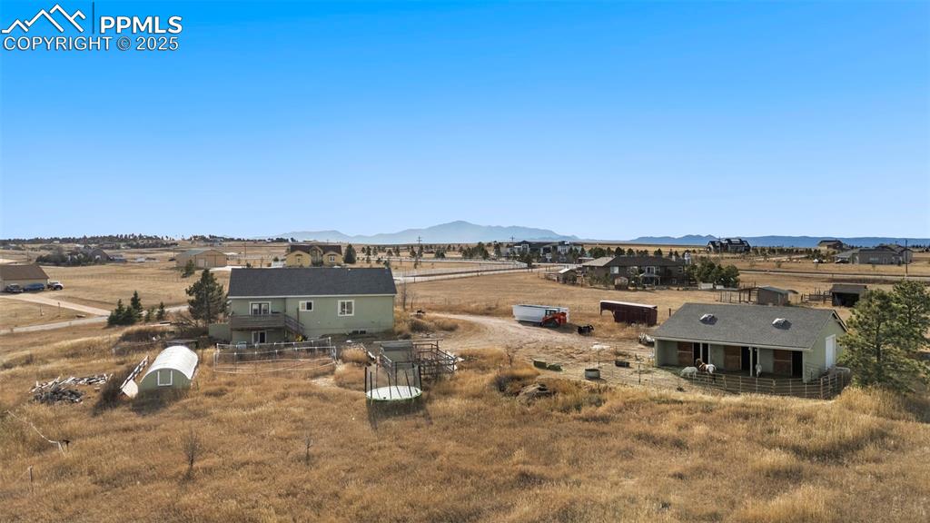 Those mountain views can be seen from the front porch and windows.