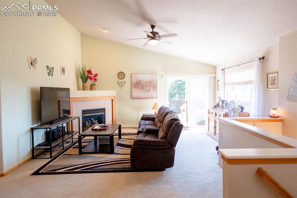 Family room with gas fireplace is at the back of the home.