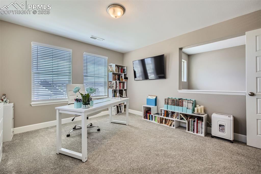 Office is open to entryway below 