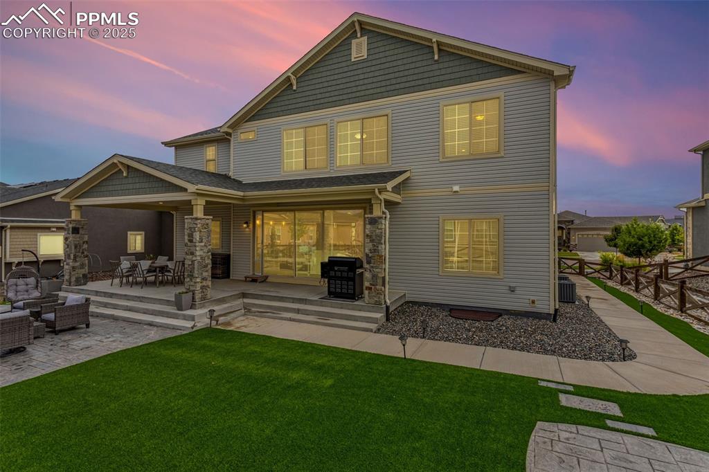 Immaculate no-maintenance backyard with extended covered patio -- ready for a hot tub!