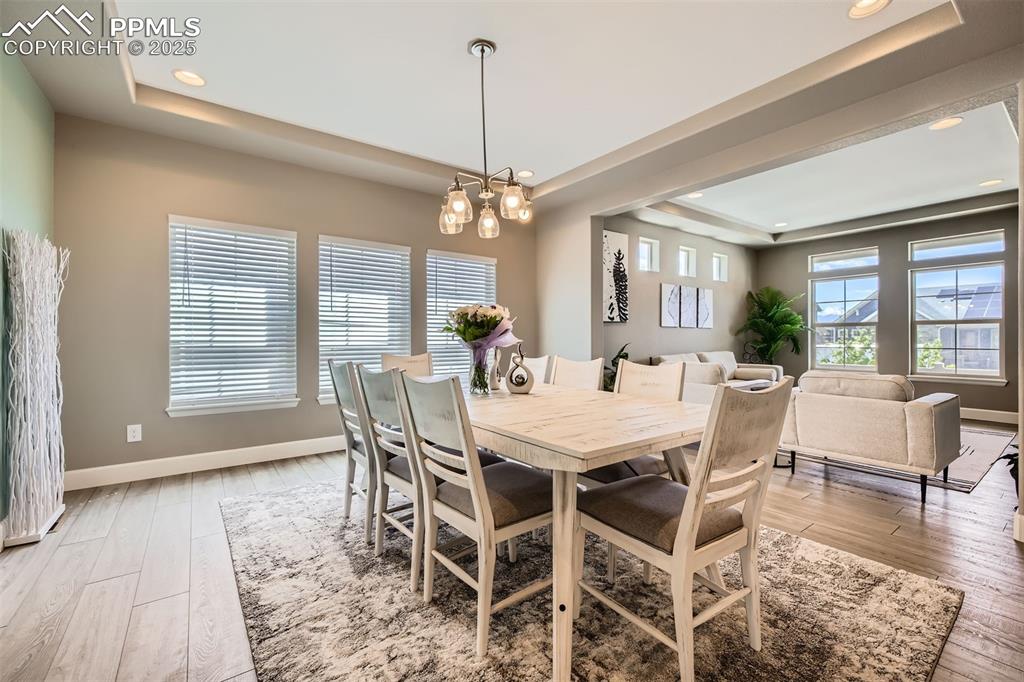 Formal dining area with luxury vinyl flooring throughout, custom paint and bullnose corners.