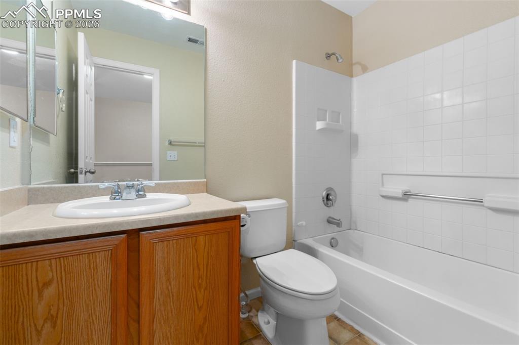 Full bath with  shower combination and vanity