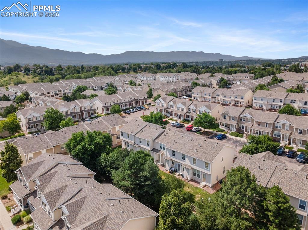 Aerial perspective of suburban area with mountains
