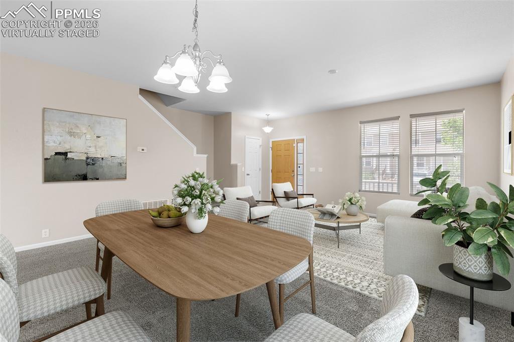 *Virtually Staged* Carpeted dining room with baseboards