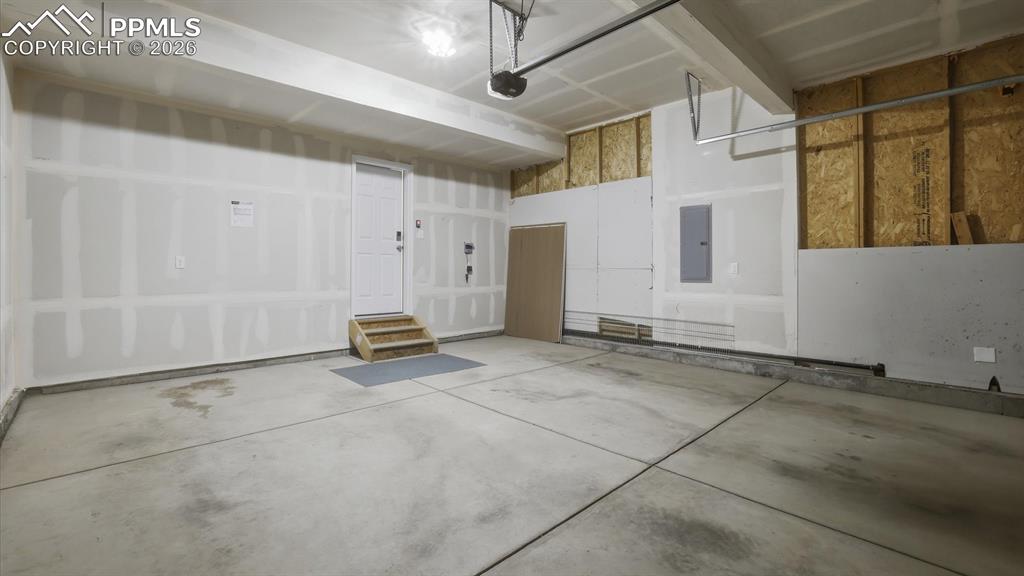 2-car attached garage with door opener.