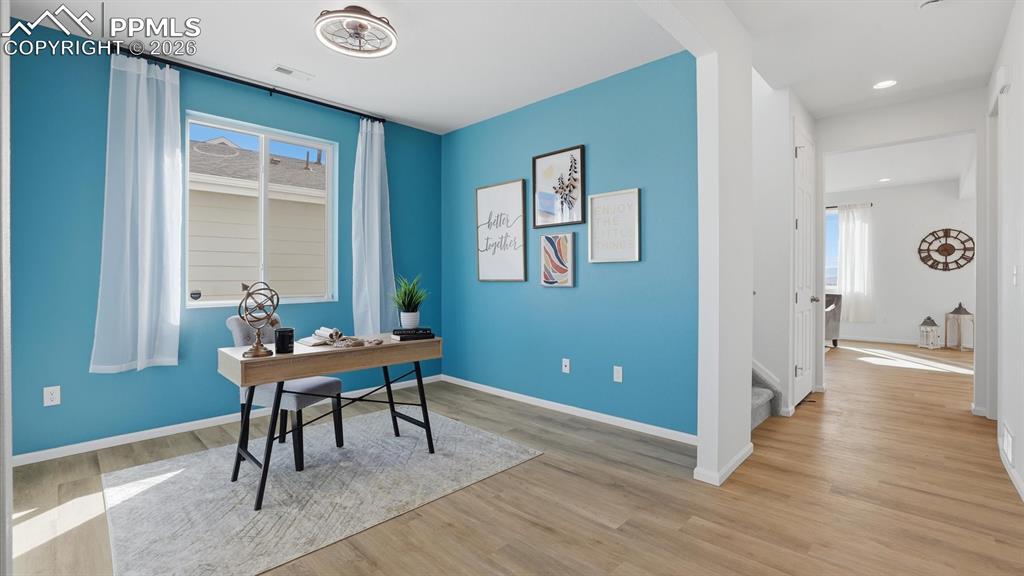 View of the Office and hallway into the Great Room from the Entry.