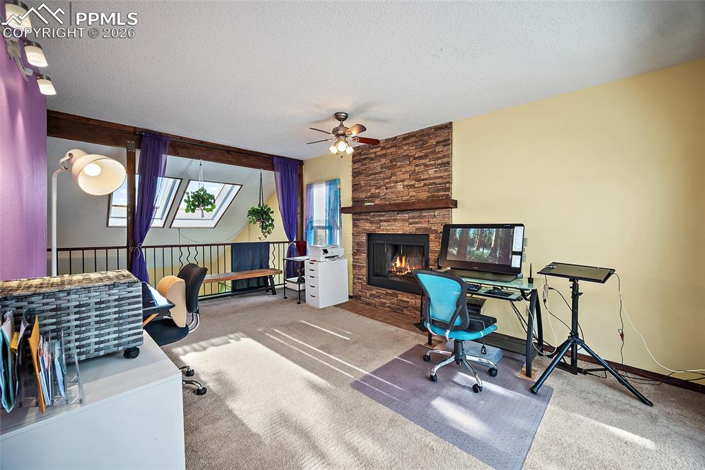Upstairs office/extra space. Overlooks main floor. Skylight views of red rocks.
