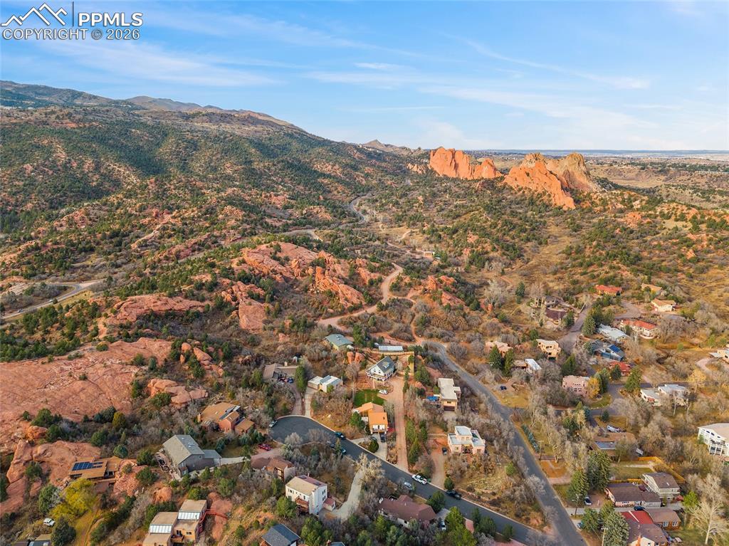 View of Garden of the Gods and surrounding areas with the entrire property in the bottom hand center of photo.