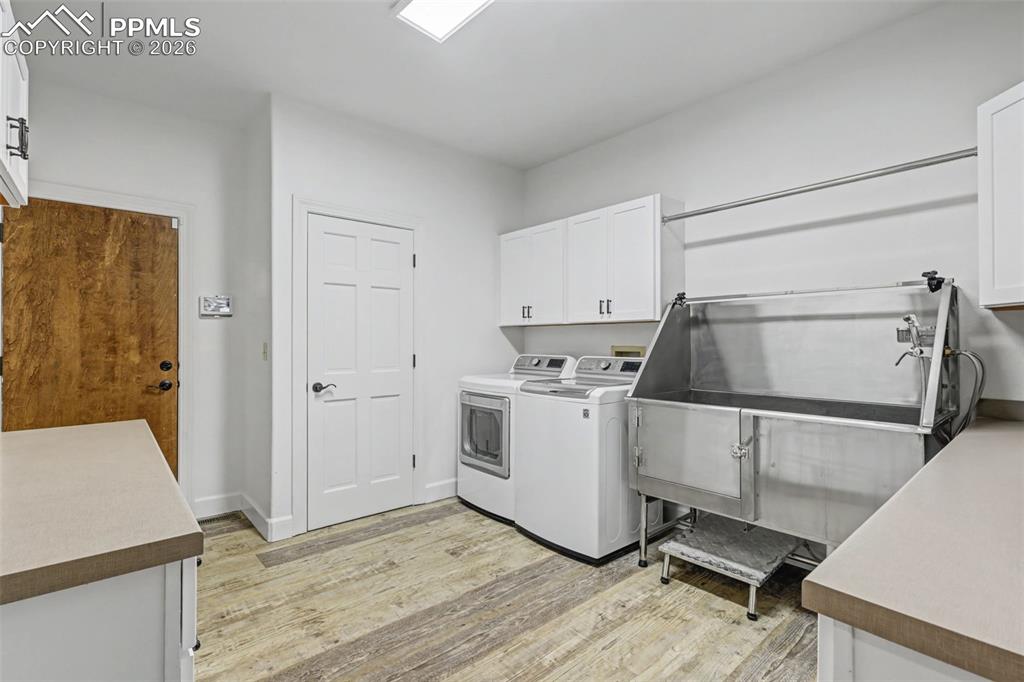 Pet washing station leading to the garage