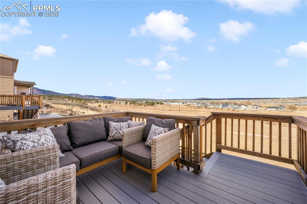 Composite deck with access from dining area and stairs to back yard