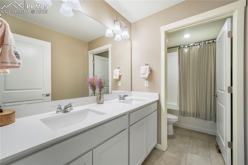 Upstairs full bathroom with quartz counters