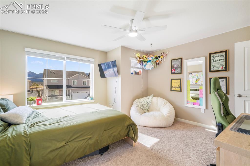 Upstairs 4th bedroom with walk in closet and views