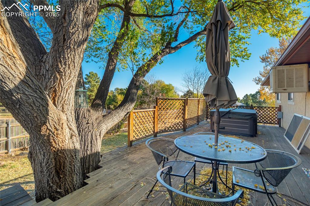 Wooden terrace with outdoor dining area