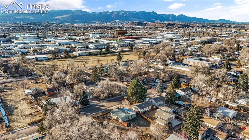 Aerial view of residential area with a mountainous background