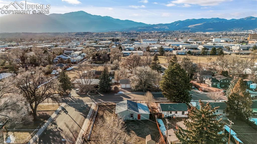 Aerial view of residential area with a mountain backdrop