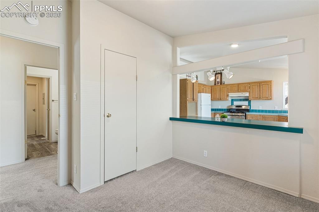 Looking into the kitchen from bedroom 3 / office. 